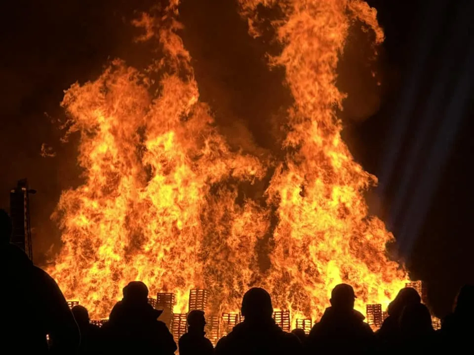 Roaring pallet bonfire in the audience area